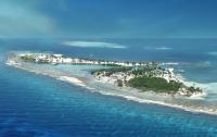 Op het barriererif van Belize ligt het atol Ariel dat hier vanuit de lucht is gefotografeerd.